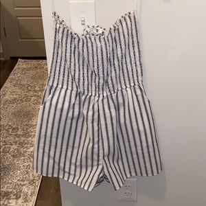 Size M sleeveless romper. White and Blue stripes!